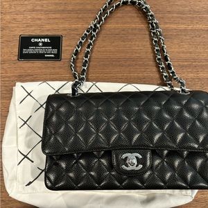 Chanel classic medium size black Caviar leather with silver hardware